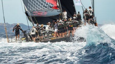 PORTO CERVO - 8 SEPTEMBER: Maxi Yacht Rolex Cup sail boat race. The event is one of international sailing most important and revered competitions. on September 8 2015 in Porto Cervo, Italy clipart