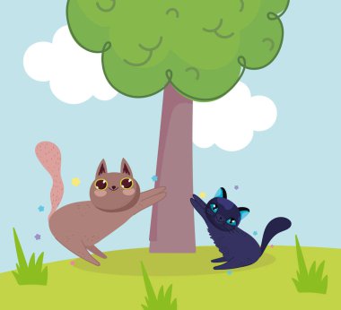 Çim çizgi filminde ağaçla oynayan sevimli kediler.