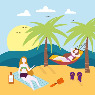 Kadınlar plajda dinleniyor