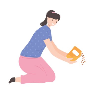 Kadın hayvan maması tutuyor.