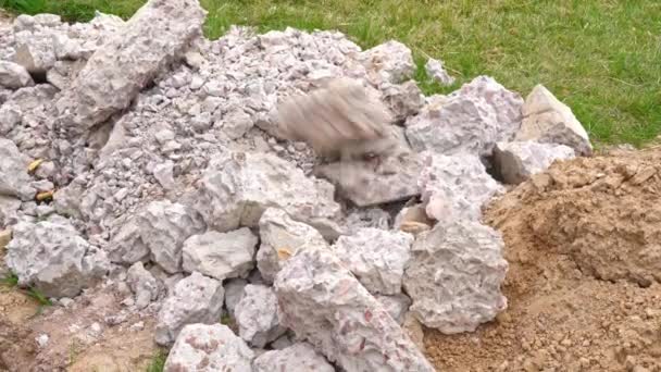 Disposal of construction concrete waste on a heap — Stock Video