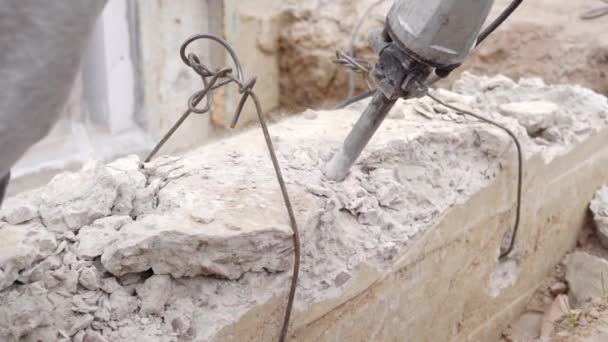 Punching solid concrete with a special jackhammer close-up, in slow motion — Stock Video