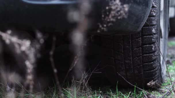Kiev, Ukraine - January 25, 2020: Tread pattern of automotive rubber close-up on a car — Stock Video