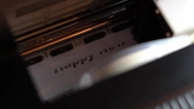 Yazıcı Mutlu Yıllar yazdırıyor