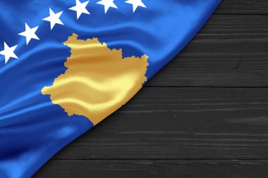Kosova 'nın bayraklarında metin başa çıkma alanı