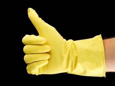 Sarı ev eldivenleri ve temizliğin sembolü gibi.