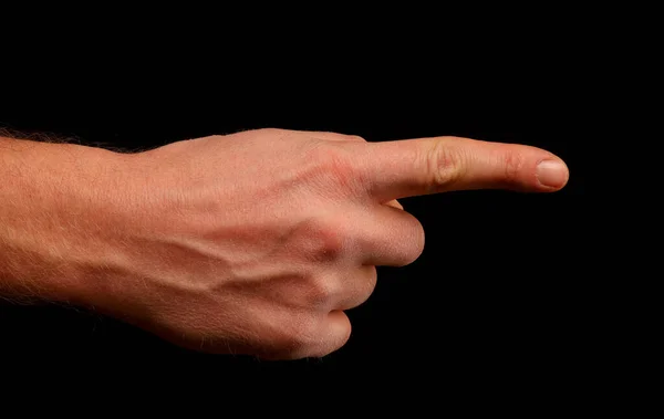 Hand Und Finger Zeigen Auf Etwas Auf Schwarzem Hintergrund — Stockfoto