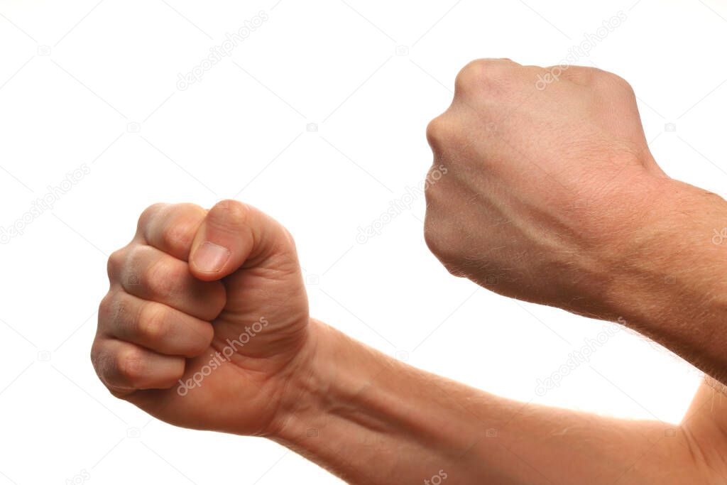 Fist on a white background as a symbol of willpower, resistance and aggression