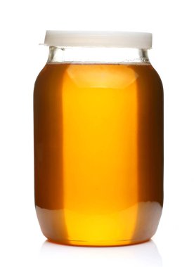 Ballı cam kavanoz beyaz izole arkaplan