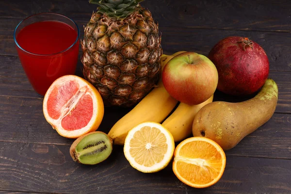 Pineapple and exotic fruits with juice