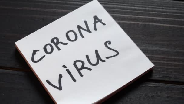 Coronavirus Inschrift Auf Notizblock Aufkleber — Stockvideo