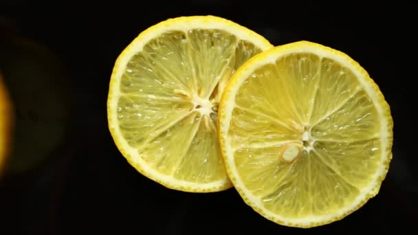 Several Slices Lemon Black Background — Stock Video