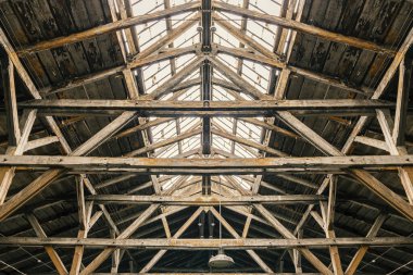 Wooden roof construction as a symbol of architecture and construction