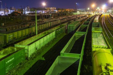LVIV, UKRAINE - October 13, 2019: Freight trains at the station at night