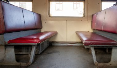 Empty bench seats on the train