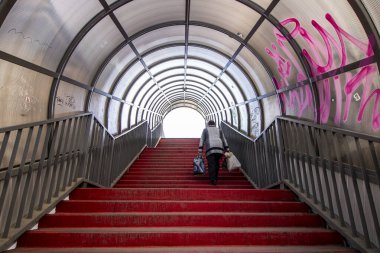 Ternopil, UKRAINE - October 12, 2019: The woman goes in the underpass