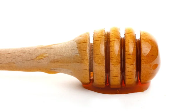 Μέλι Στάζει Από Ένα Ξύλινο Dipper Λευκό Φόντο Απομονωθεί — Φωτογραφία Αρχείου
