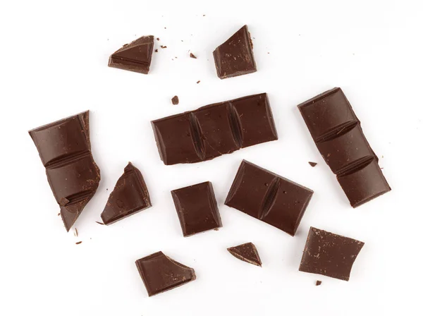 Pedaços Chocolate Escuro Fundo Branco Isolado — Fotografia de Stock