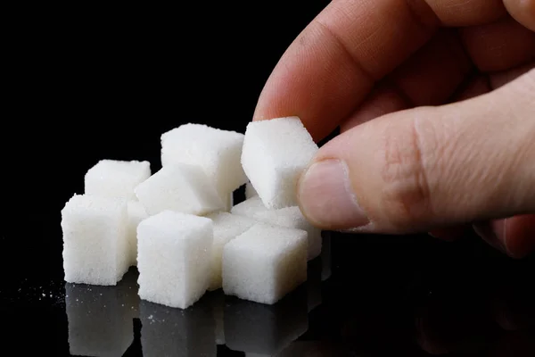 Pieces Sugar Hand Black Background — Stock Photo, Image