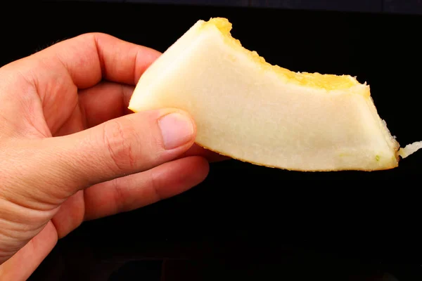 Melon Sliced Hand Black Background — Stock Photo, Image