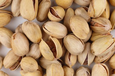 Fıstıklar lezzetli fındıklardır. Bir sürü sağlıklı fındık