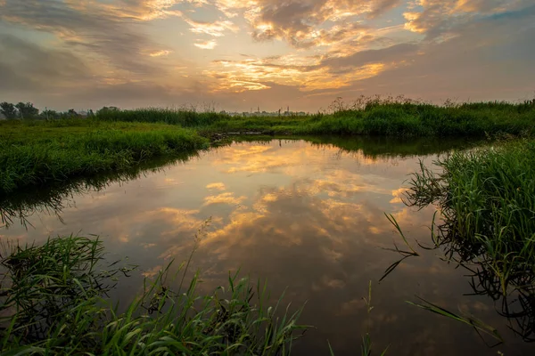 stock image Beautiful landscape is the beginning of a new day on the lake