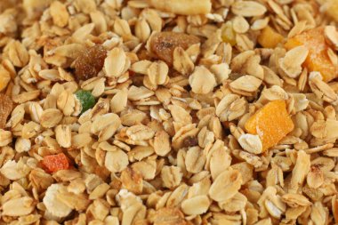 This granola mix features oats and various dried fruits for a tasty snack.