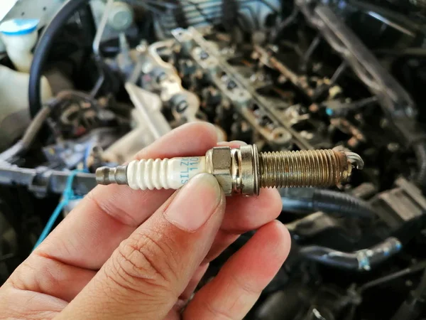 Iridium Car Spark Plug Mechanic Hand Car Engine Blurred Background — Stock Photo, Image