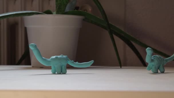 Child Playing Plasticine Dinosaur Figurines Handcraft Concept — Stock Video