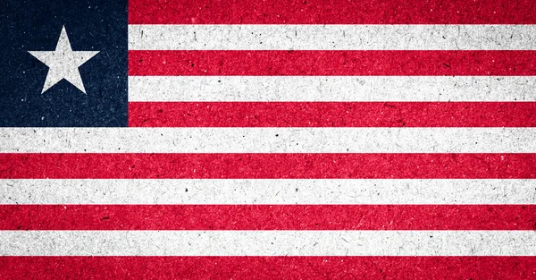 Liberia flag on paper background — Stock Photo, Image