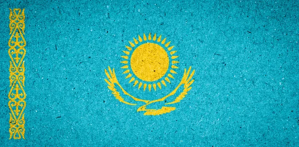 Bandiera Kazakistan su sfondo cartaceo — Foto Stock