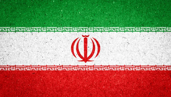 Iran flagga på papper bakgrund — Stockfoto