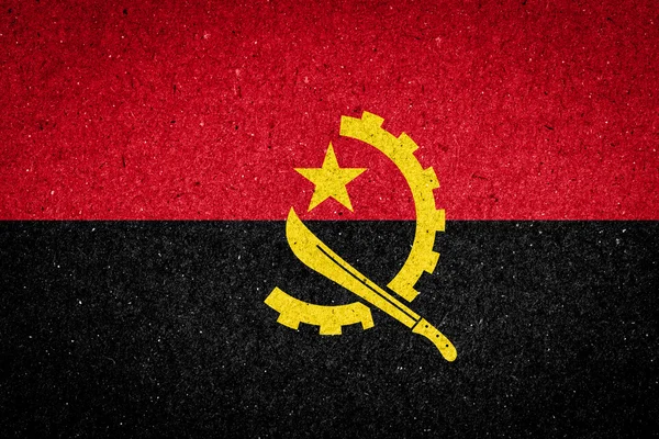 安哥拉国旗纸张背景上 — 图库照片