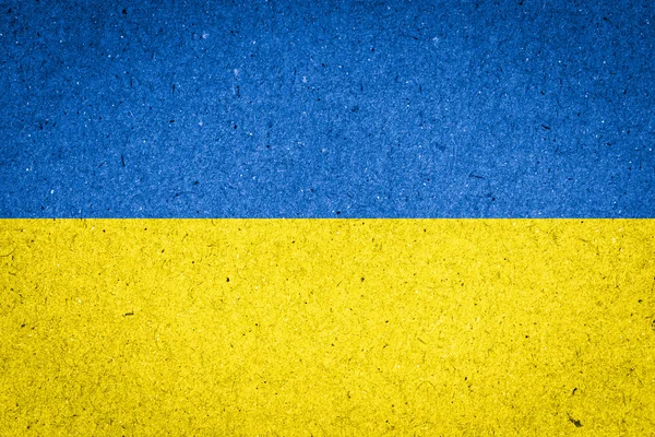 Ukrainische Flagge auf Papierhintergrund — Stockfoto