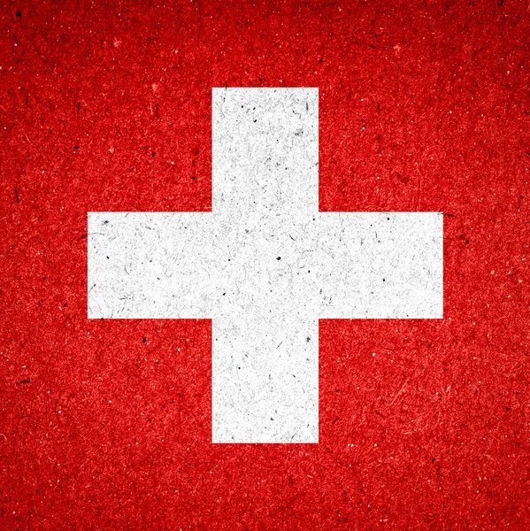 Bandeira da Suíça sobre fundo de papel — Fotografia de Stock