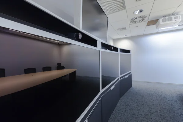 Empty Video Conference Room with blank screen