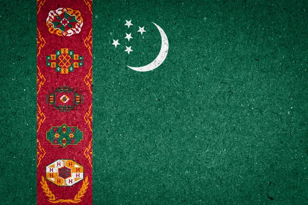 Türkmenistan Flagge auf Papier Hintergrund — Stockfoto