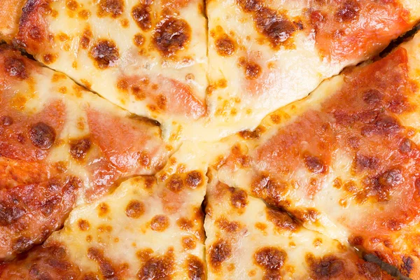 Pepperoni pizza close up background — Stock Photo, Image