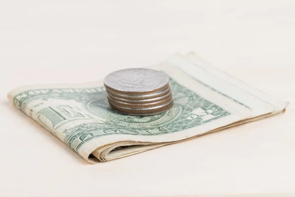 Used US banknotes on wood table close up — Stock Photo, Image