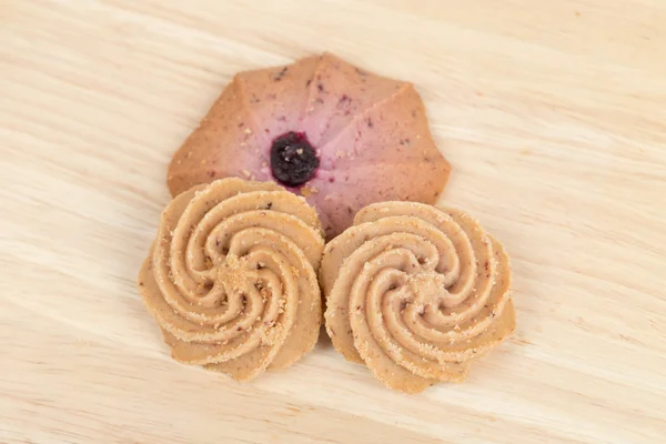 Kekse auf hölzernem Tischhintergrund in Nahaufnahme — Stockfoto