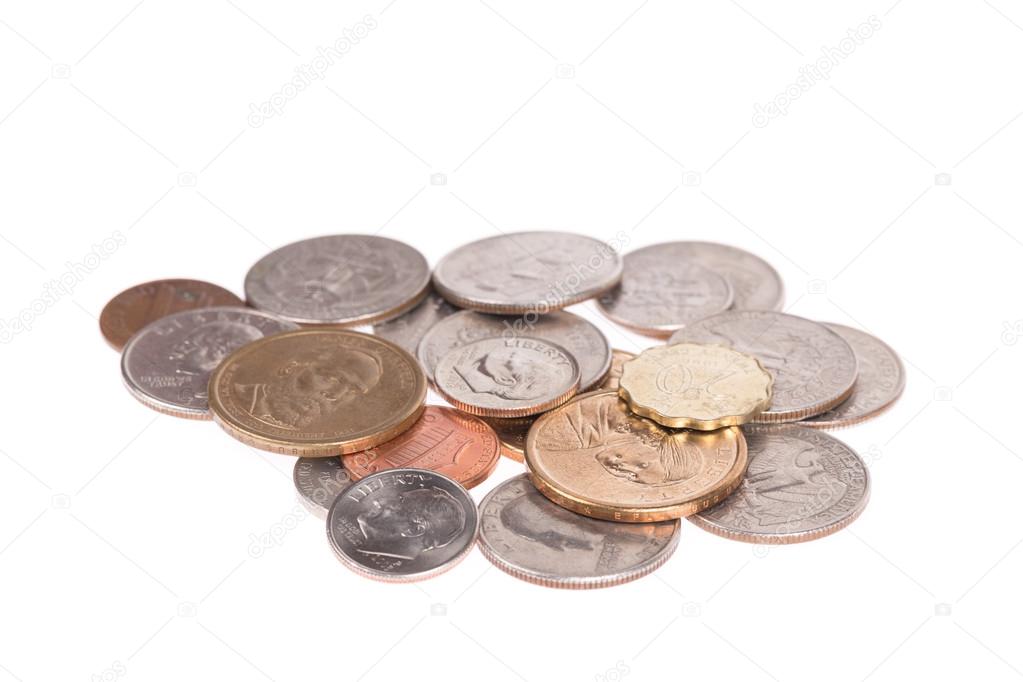 Pile of US coins isolated on white background