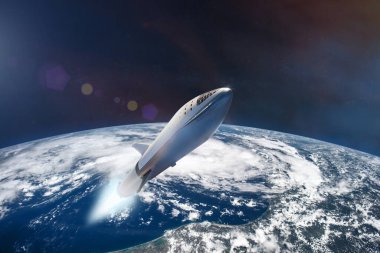 Alçak Dünya yörüngesindeki yıldız gemisi. Bu görüntünün elementleri NASA tarafından desteklenmektedir.
