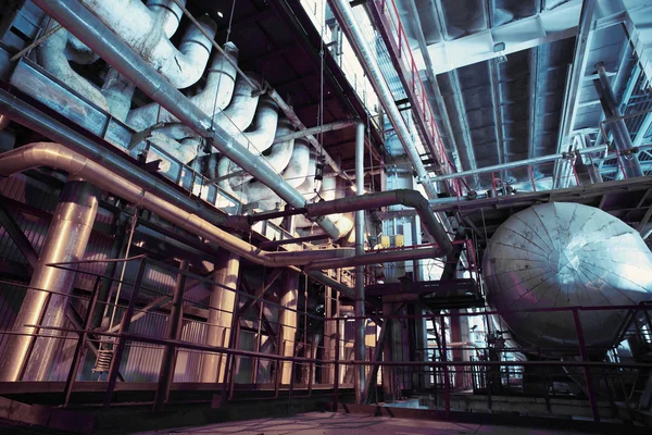 Different size and shaped pipes and valves at a power plant — Stock Photo, Image