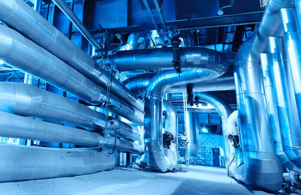 Equipment, cables and piping as found inside of a modern industr — Stock Photo, Image