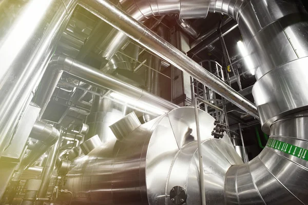 Different size and shaped pipes and valves at a power plant — Stock Photo, Image