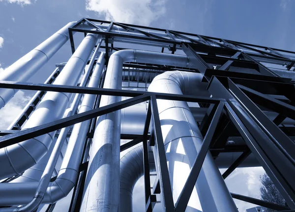 Equipment, cables and piping as found inside of a modern industr — Stock Photo, Image