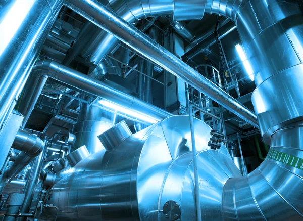 Different size and shaped pipes and valves at a power plant — Stock Photo, Image