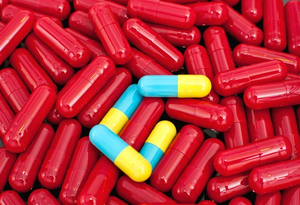 Red colorful capsules — Stock Photo, Image