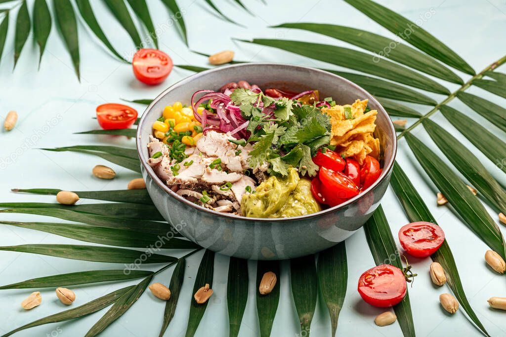 Hawaiian chicken poke bowl with rice and vegetable