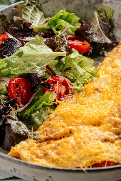 Rustic omelette with vegetables salad — Stock Photo, Image